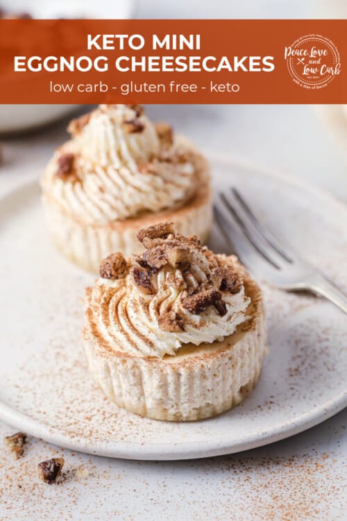 A serving platter with mini cheesecakes, topped with whipped cream and candied nuts.